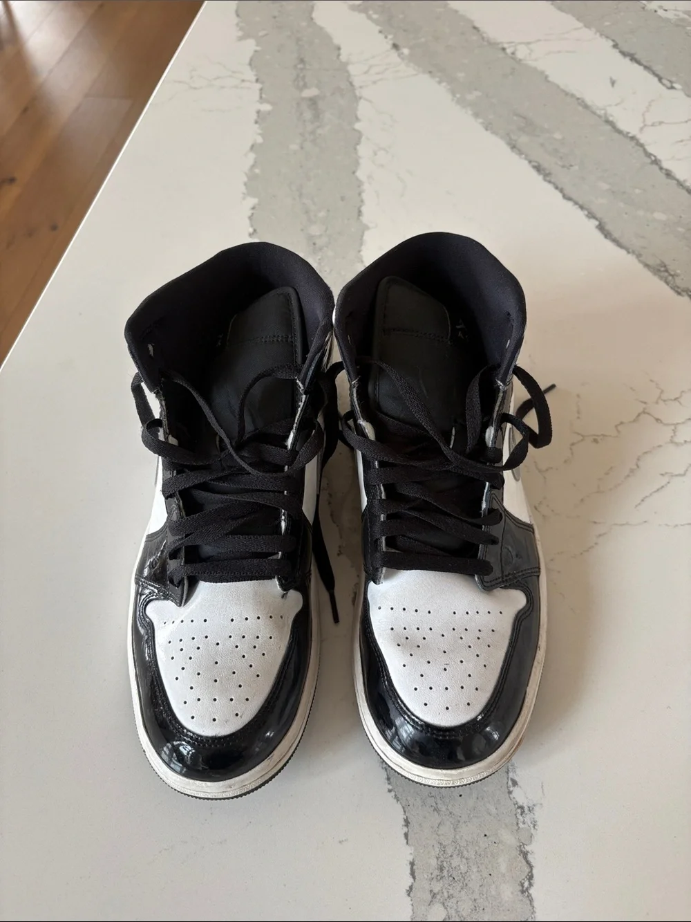 Like new Nike Black patent, silver and White Mid AirJordan
